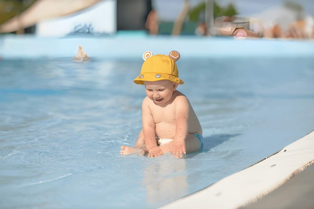 Child experiencing calm and joy during a swimming lesson